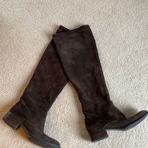 Over the knee suede boots with rubber soles.